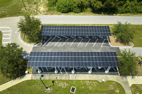 Aerial View Of Solar Panels Installed As Shade Roof Over Parking Lot