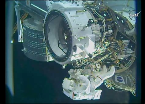 Nasa Astronauts Successfully Install New Space Station Docking Port Space