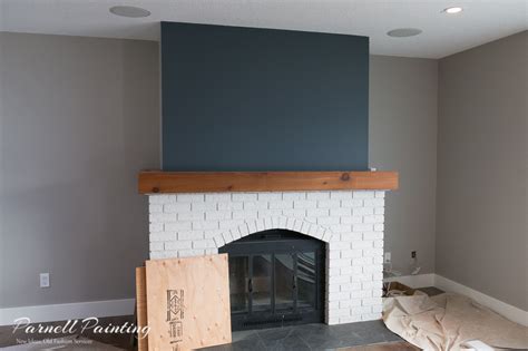 I will be doing a dark grey accent wall. dark blue fireplace accent wall against grey