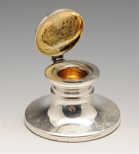 A Modern Silver Inkwell Of Plain Capstan Form With Filled Base The