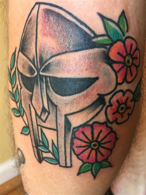 Mf doom tattoo traditional flowers | Traditional tattoo ...