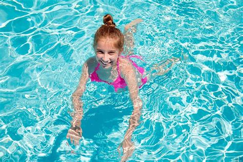 Teenage Girl Swimming In Swimming Pool Swimming Vacation Young Photo