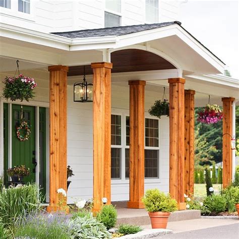 we covered the plain white pillars on our front porch with cedar and we love the results now i