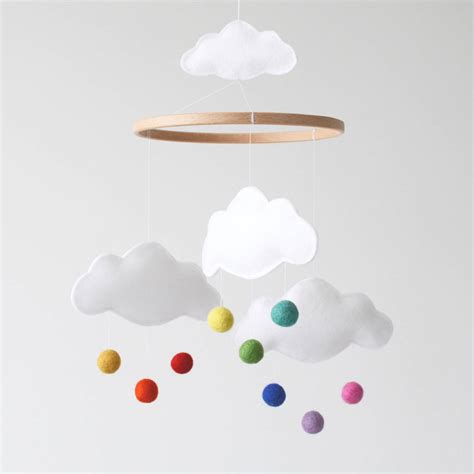 They entertain and distract the baby, while also saving the parent's time spent on cajoling an. white cloud and rainbow baby mobile by littlenestbox ...