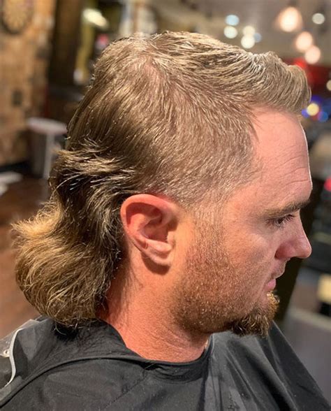 The mullet is a hairstyle in which the hair is cut short at the front and sides, but is longer at the back. Mullet Haircut: 60 Ways To Get A Modern Mullet - Men's ...