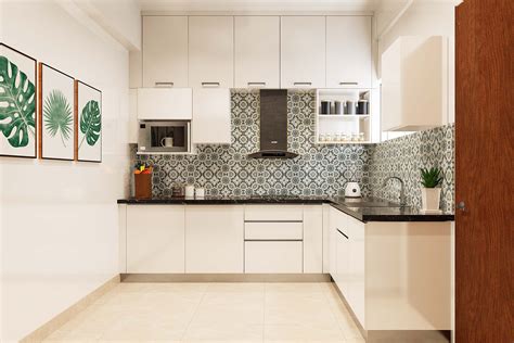 Spacious L-Shaped Modular Kitchen Design With Gola Handles | Livspace