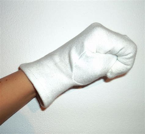 gloved hand fist by stockpicked on deviantart