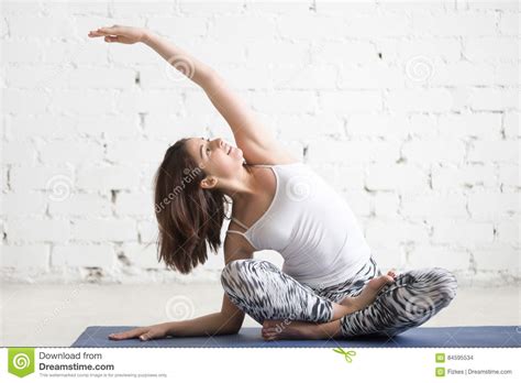 Young Attractive Woman In Bending Sukhasana Pose White Studio Stock