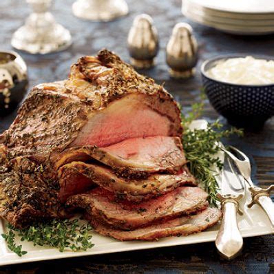Pull the rib roast out of the fridge and let temper on the counter for three hours. Stand Rib Roast Christmas Menu : Standing Rib Roast with ...