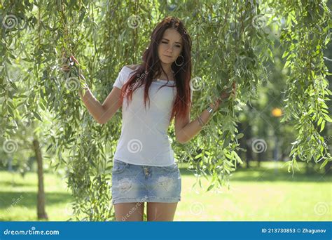 Erotic Girl With Mini Skirt On Green Grass Stock Image Image Of Exterior Dress 213730853