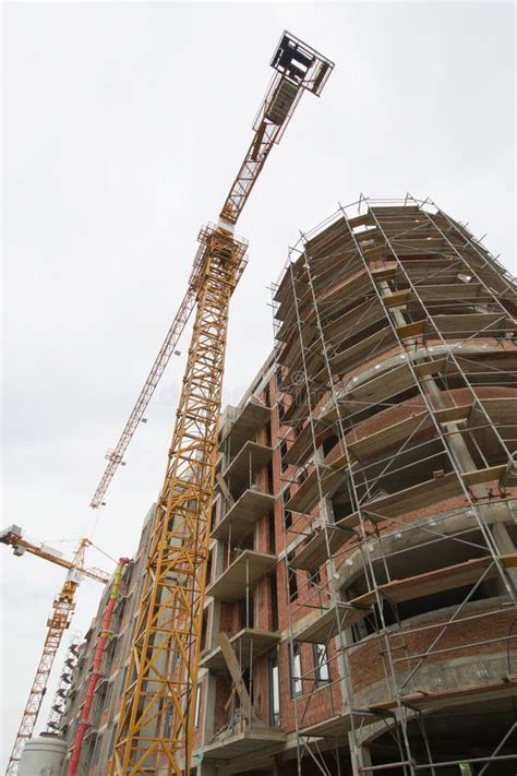 Building Under Construction With Workers Stock Photo Image Of