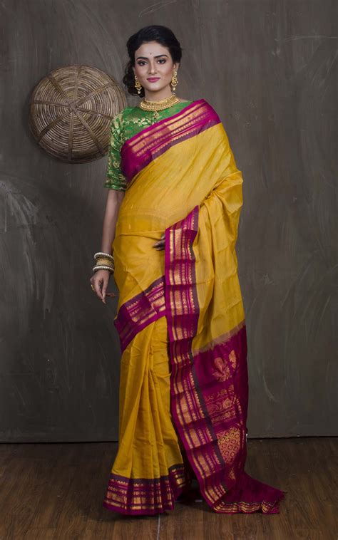 Pure Silk Cotton Gadwal Saree In Turmeric Yellow And Magenta Indian