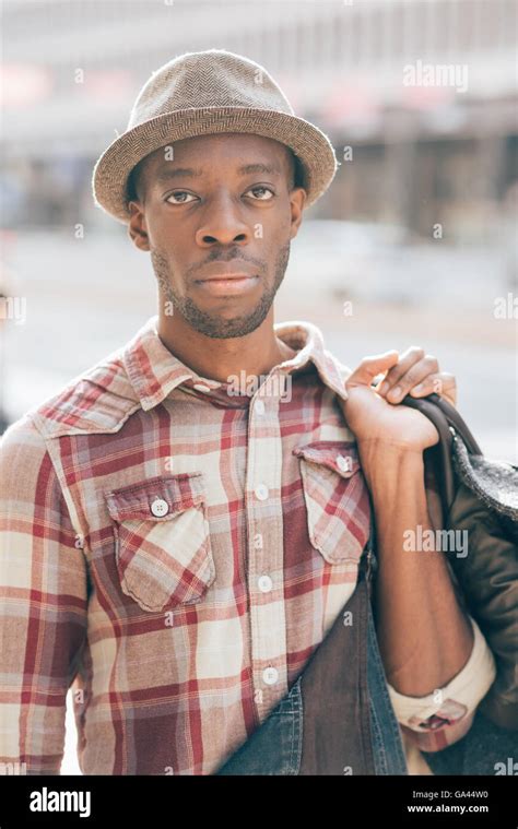 Half Length Portrait Of Young Handsome Afro Black Man Looking In Camera