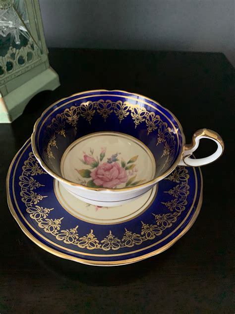 Antique Aynsley England Bone China Tea Cup And Saucer Cobalt Blue With White Flowers Gold
