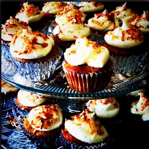 In a small mixing bowl whisk together dry ingredients: Carrot cake cupcakes with cream cheese frosting and ...
