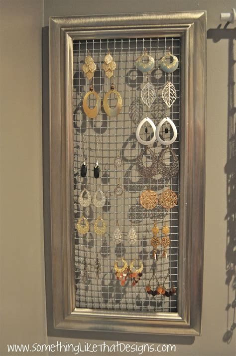 You can now stick earrings into the mesh. DIY earring holder | Jewelry wall, Diy jewelry holder ...