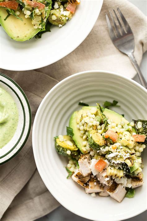 A couscous bowl with loads of veggies, lemony chicken, and tzatziki sauce! Avocado Feta Bowl with Couscous Grilled Chicken and ...