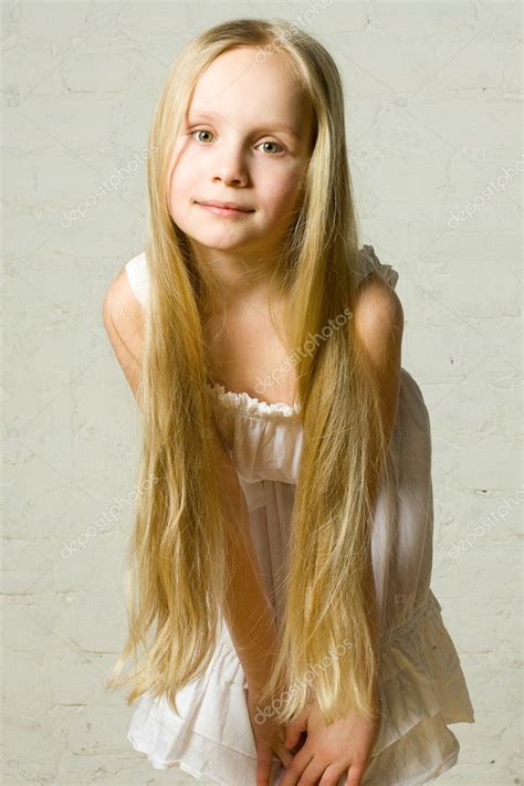 Smiling Child Girl With Long Blond Hair Portrait Stock Photo By