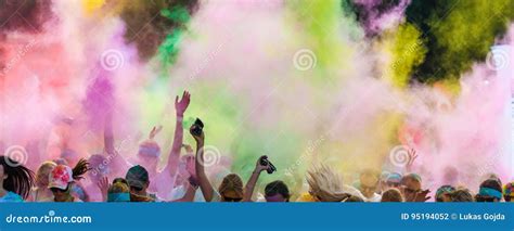 Close Up Of Marathon People Covered With Colored Powder Editorial