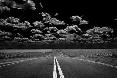 A Long Dark Road Photograph By Bill Tiepelman