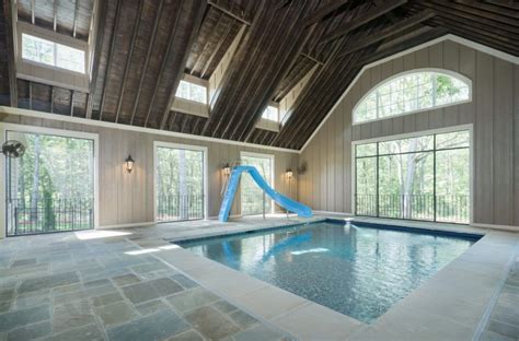 An Amazing Indoor Pool Slide Of This Custom Built Home By Goodwin