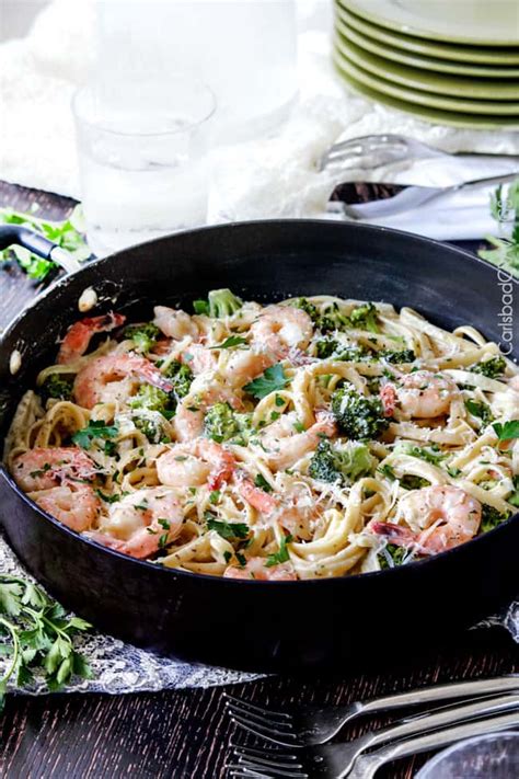 This easy shrimp alfredo pasta recipe is the perfect fast weeknight dinner that's tasty enough for company! 30 Minute Roasted Shrimp and Broccoli Fettuccine Alfredo (Lightened up!) - Carlsbad Cravings