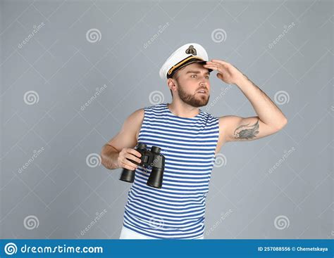 Sailor With Binoculars On Light Grey Background Stock Photo Image Of