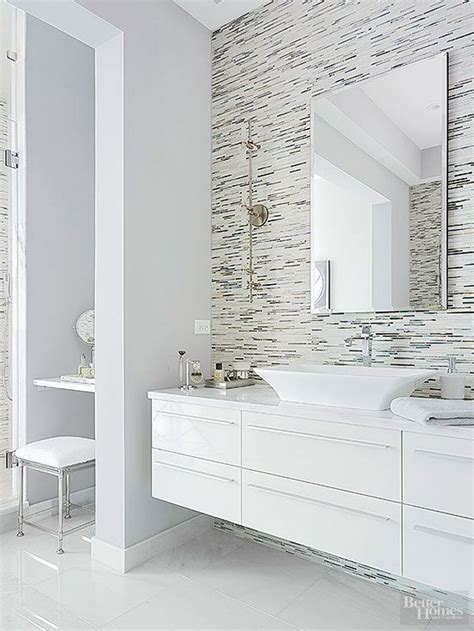 Think glossy white countertops, concrete floors and slabs of marble or quartz. Dramatic Bathroom Architecture | Modern white bathroom ...