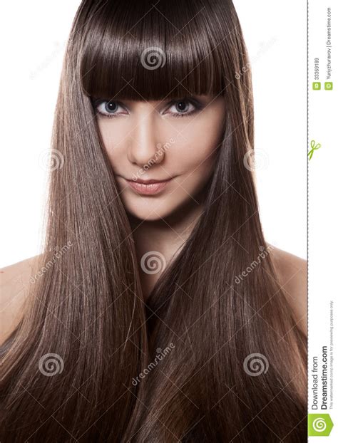 Portrait Of A Beautiful Brunette Woman With Long Straight
