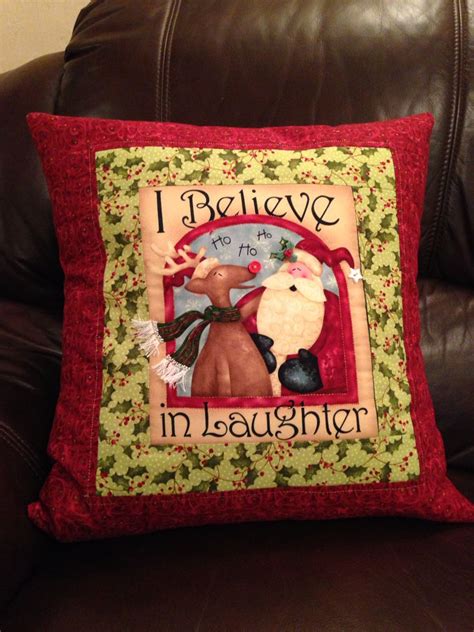 A Pillow That Says I Believe No One Is In The House With Santa Clause On It
