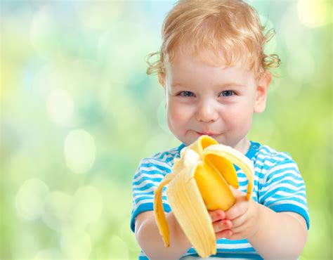 Child Eating Banana