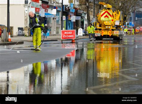 The Clean Up Effort Following Flooding On Clapham Road Hi Res Stock
