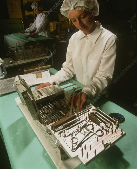 Medical Technician Preparing Surgical Instruments Stock Image M554