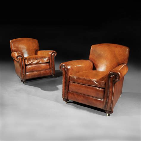 Pair Of Antique Leather Club Armchairs