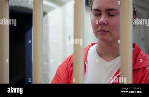 Female Prisoner Sad Regret Behind Bars In Modern Prison 4k Inmate