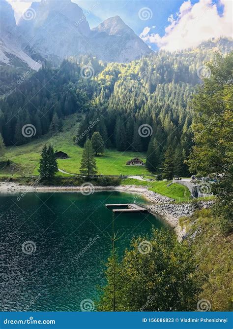 Incredible View Of The Mountains And The Emerald Lake At Salzkammergut