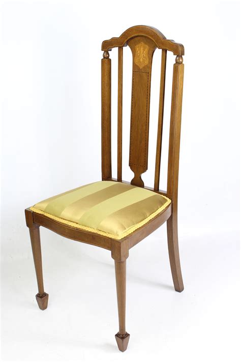 In 1950, the plastic side chair and plastic armchair were put on the market as the first industrially manufactured plastic chairs in history. Pair Antique Edwardian Mahogany Side Chairs