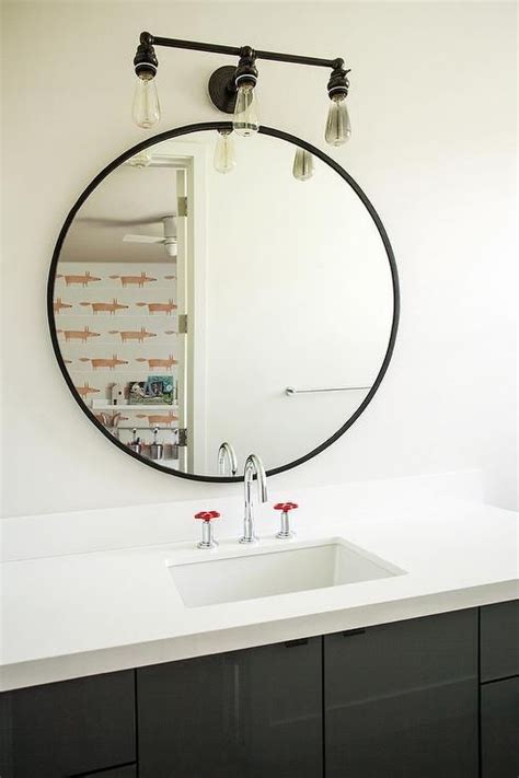 Add a few mirrors in your home to both add light and create the illusion of more space. Sometimes all you need is a simple round mirror to ...
