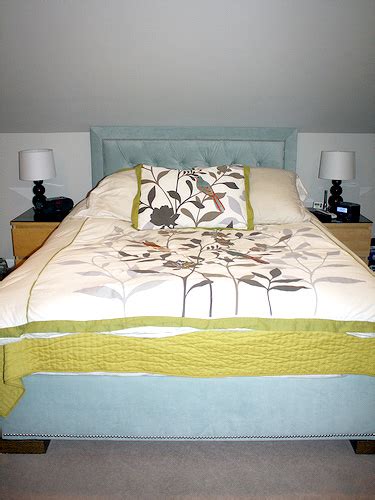 Maybe you would like to learn more about one of these? Remodelaholic | Upholstered Headboard & Bed Frame