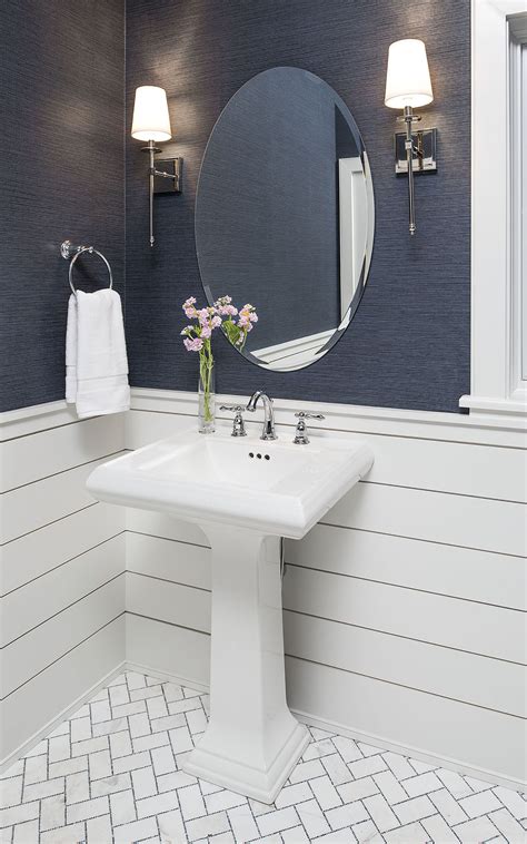 This bathroom redesign includes large scale porelain marble look tiles, underfloor heating, concealed storage drawers and features a chevron floor tile. white marble and glass tile floor, chevron floor tile ...