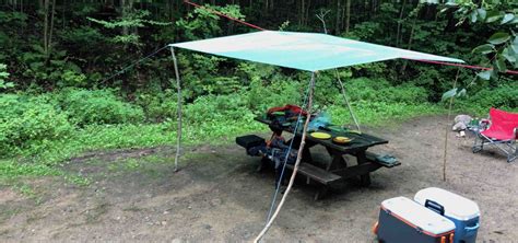 How To Properly Set Up A Tarp For Rain Or Shade Over A Picnic Table