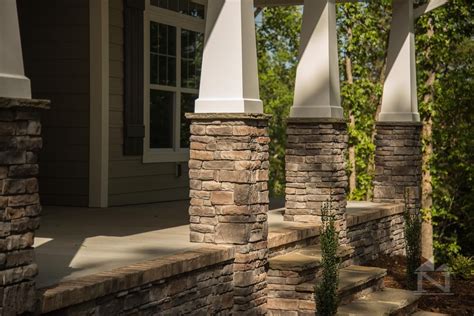 craftsman style front porch columns with stone accent home built by north point custom builders