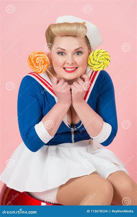 Candy Woman In Retro Pin Up Style Blonde Girl With Candies In Hands