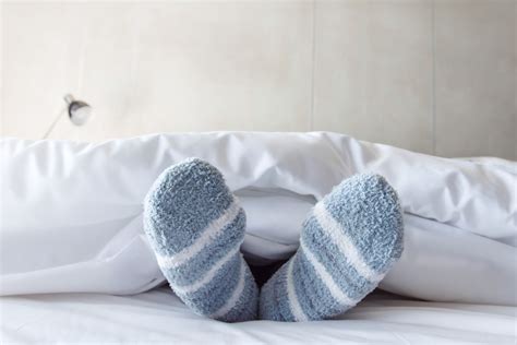 The Truth About Why Some People Love Sleeping With Socks On And Others