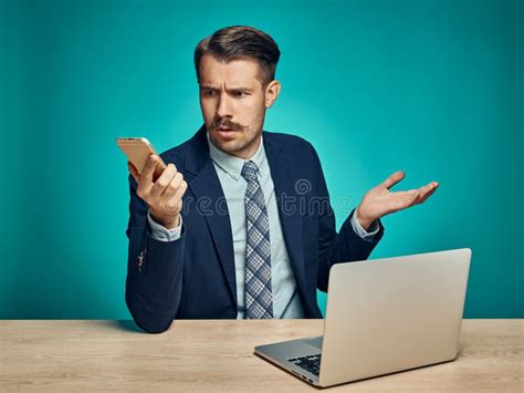 Sad Young Man Working On Laptop At Desk Stock Image Image Of Bored