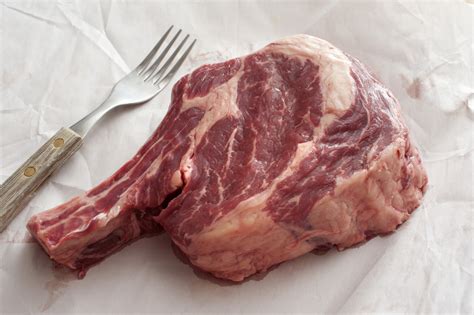 Thick Juicy Fatty Uncooked Rib Eye Beef Steak Free Stock Image