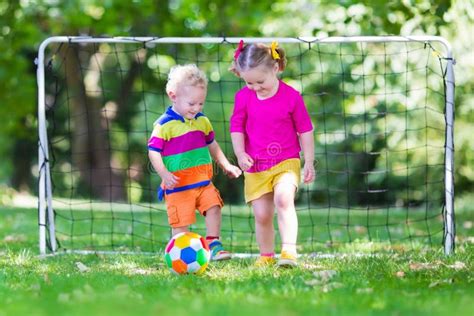 Kids Playing Football In School Yard Stock Image Image Of Action