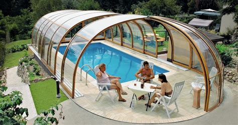 A Clear Roof That Turns An Outdoor Pool Into An Indoor One Pool