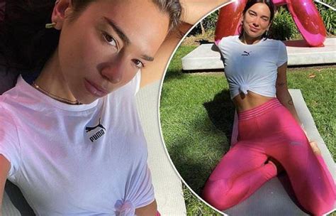 Dua Lipa Flaunts Her Toned Physique In Workout Clothes As She Poses In