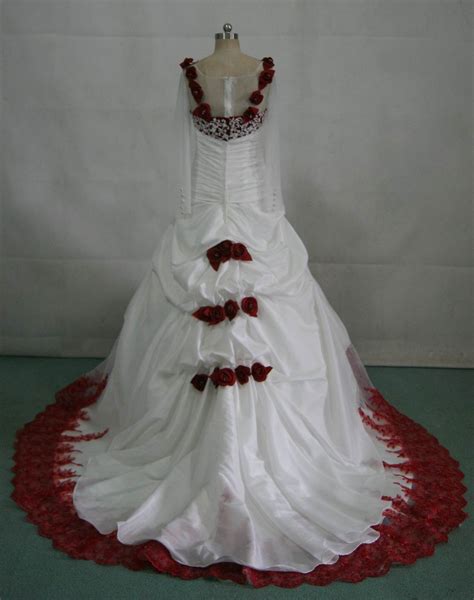 White Wedding Gown With Red Roses